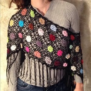 Lace crocheted poncho with colorful flowers